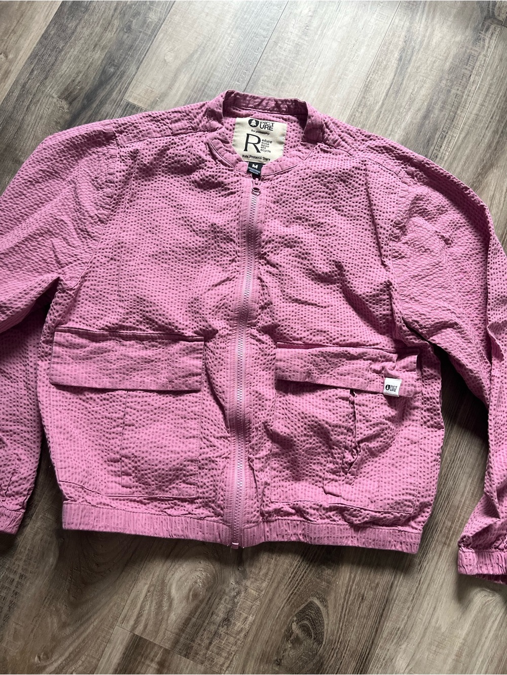 Picture women’s seersucker jacket size medium
